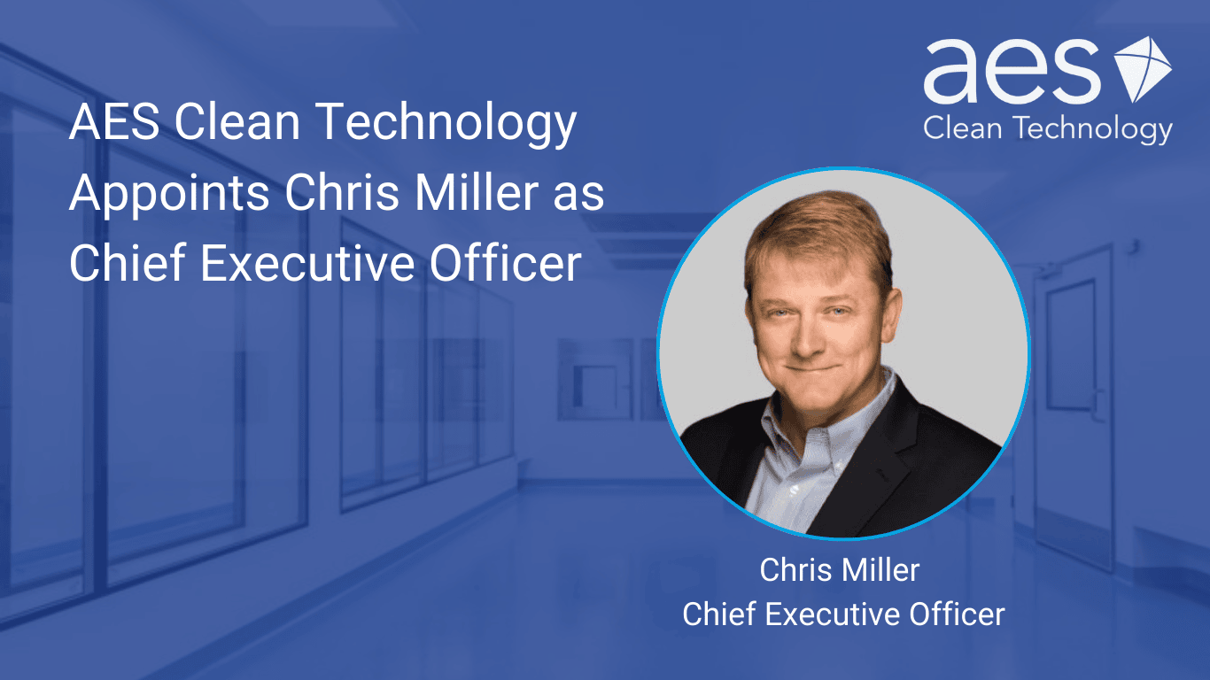 Chris Miller headshot in front of a biopharma modular cleanroom designed by AES Clean Technology